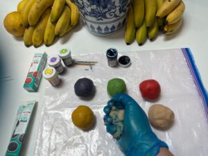 Adding the food colouring to the homemade play-dough